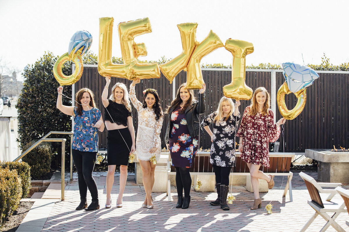 Bridal Shower Photographer | Bride-to-be celebrating at Liberty House with views of New York City skyline | Jersey City, New Jersey