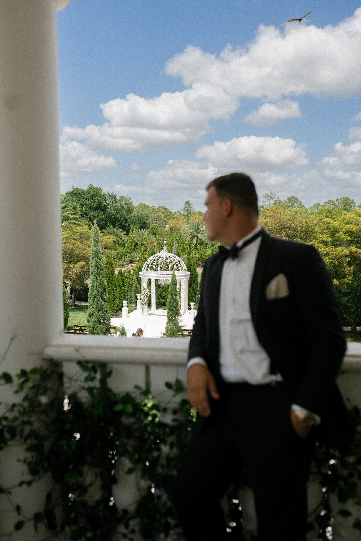Groom preparing for ceremony at La Casa Toscana wedding venue