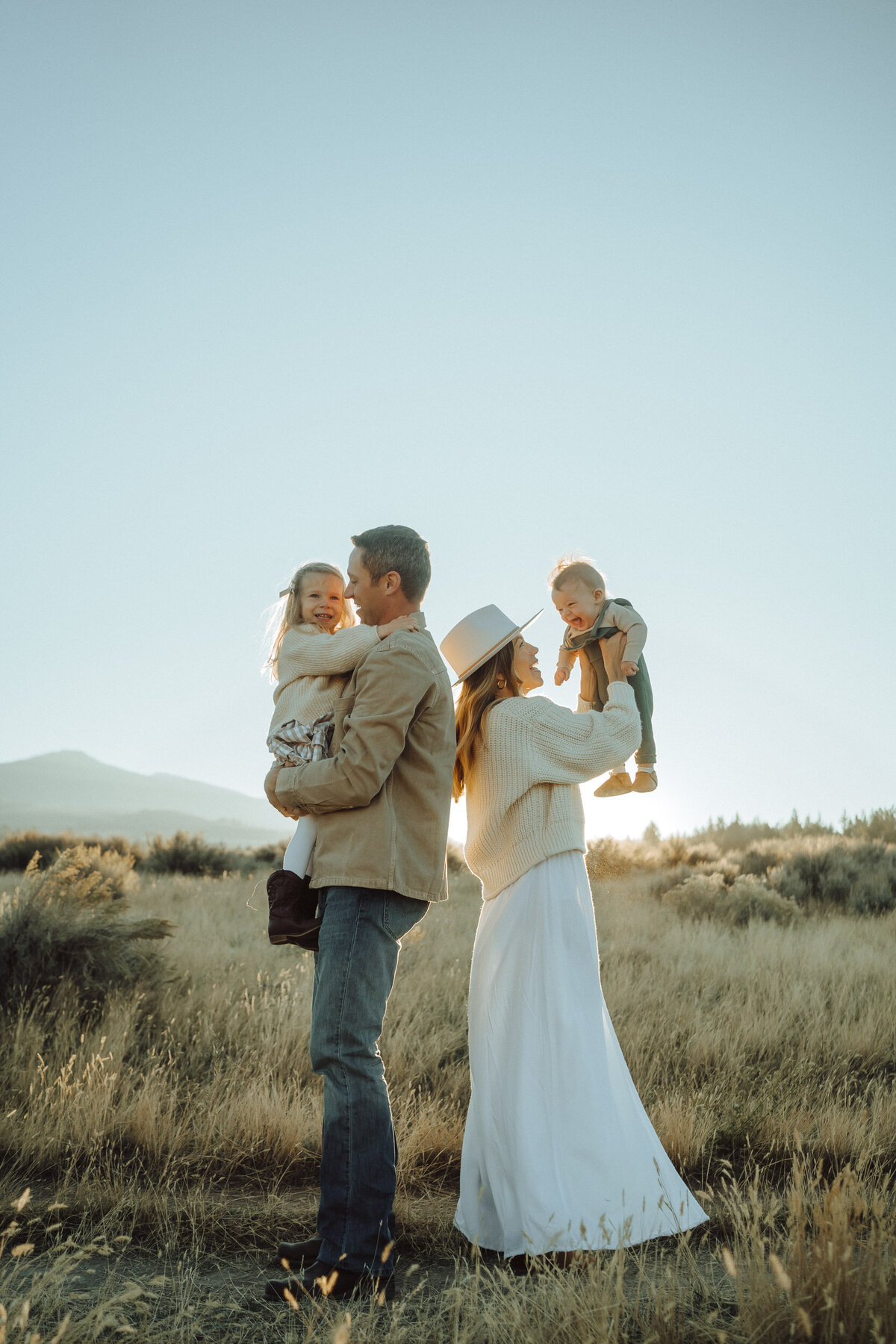 family photo session in field of montana