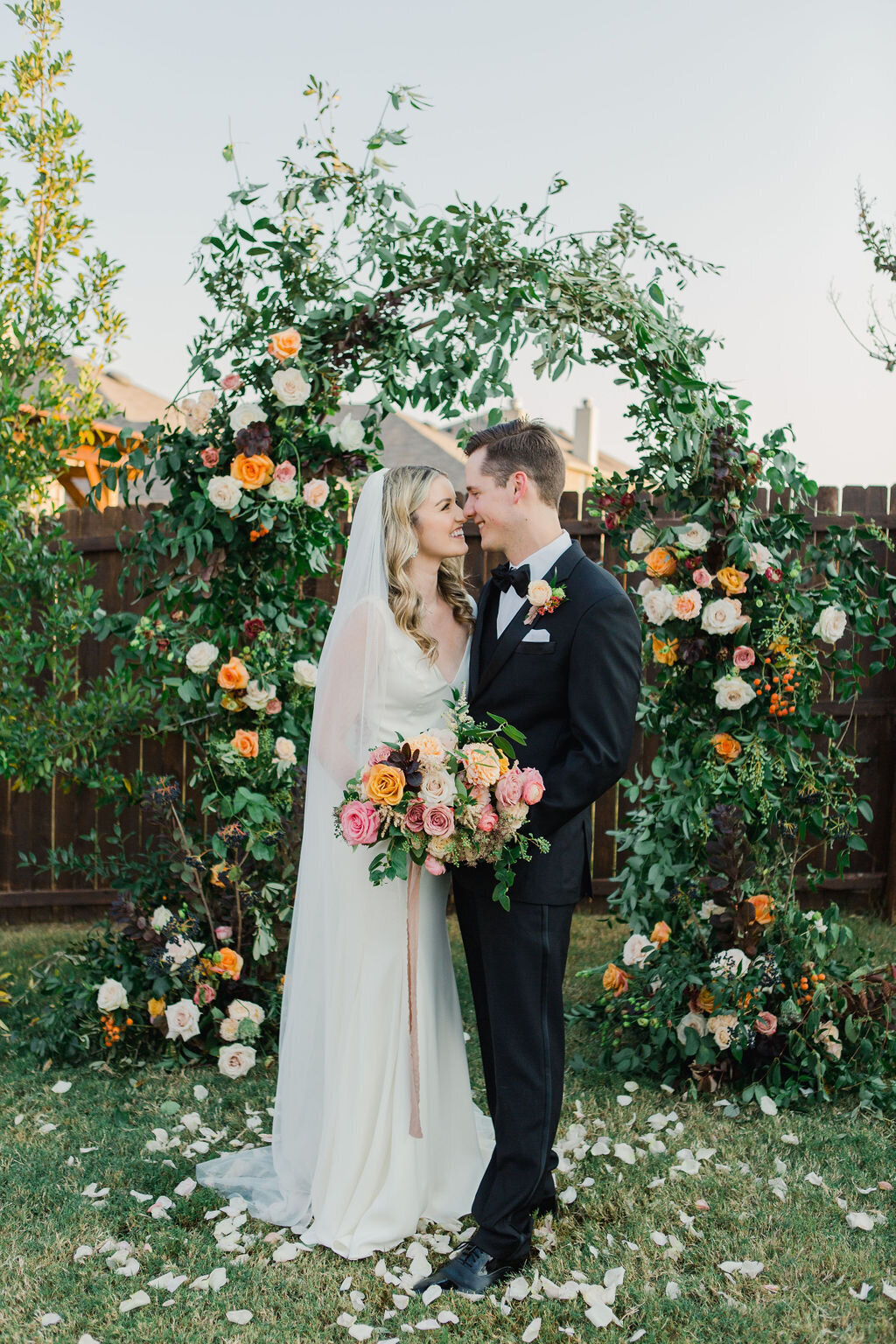 Wedding ceremony in Fort Worth with Floral Arch by Vella Nest Floral - Best Dallas Wedding Florist