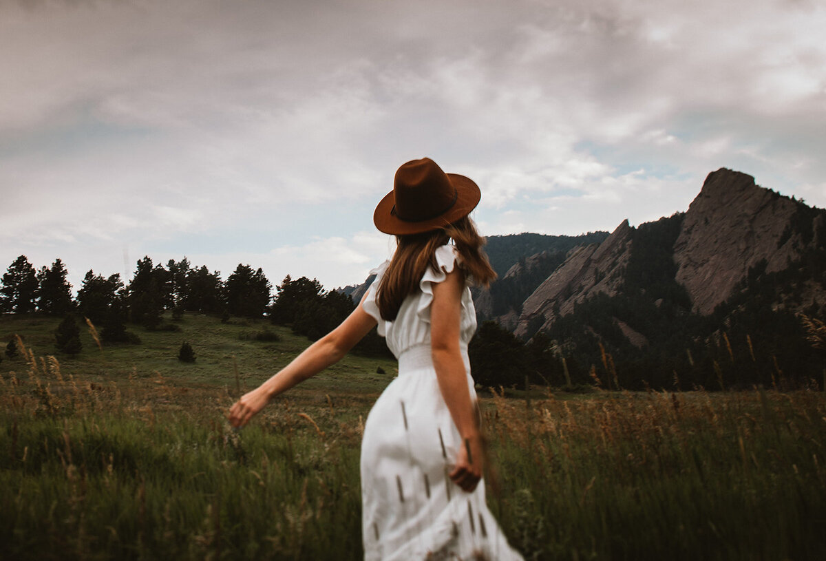 chautauqua senior girl in white dress spinning