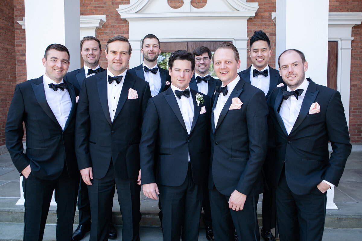Groom and groomsmen in front of Fairfield Connecticut church