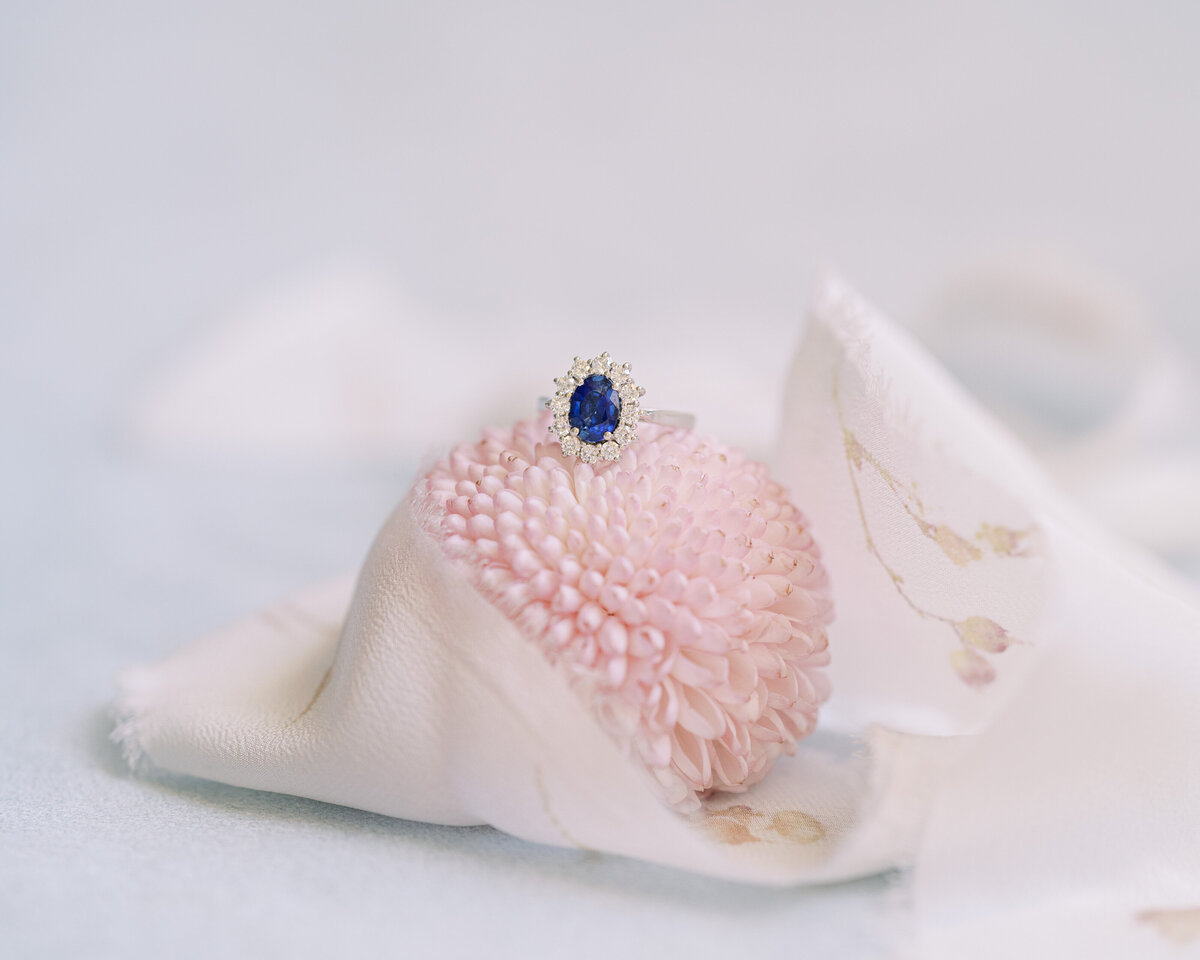 Sapphire engagement ring and flowers