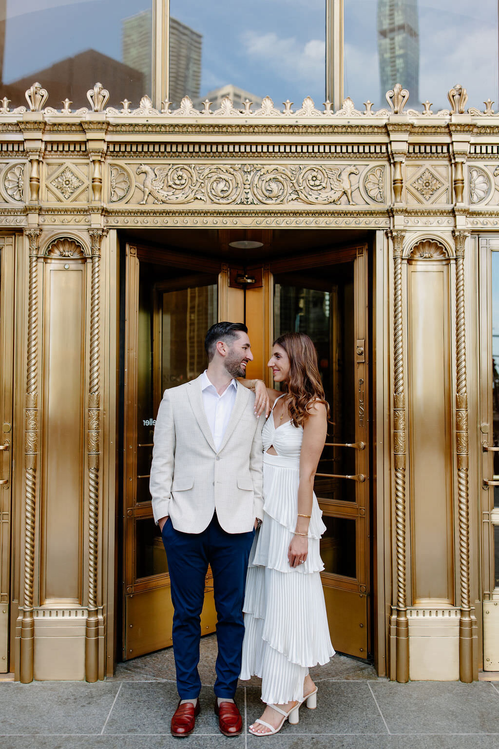An engagement photography session at The Wrigley Building and North Ave Beach in Chicago, Illinois - 5
