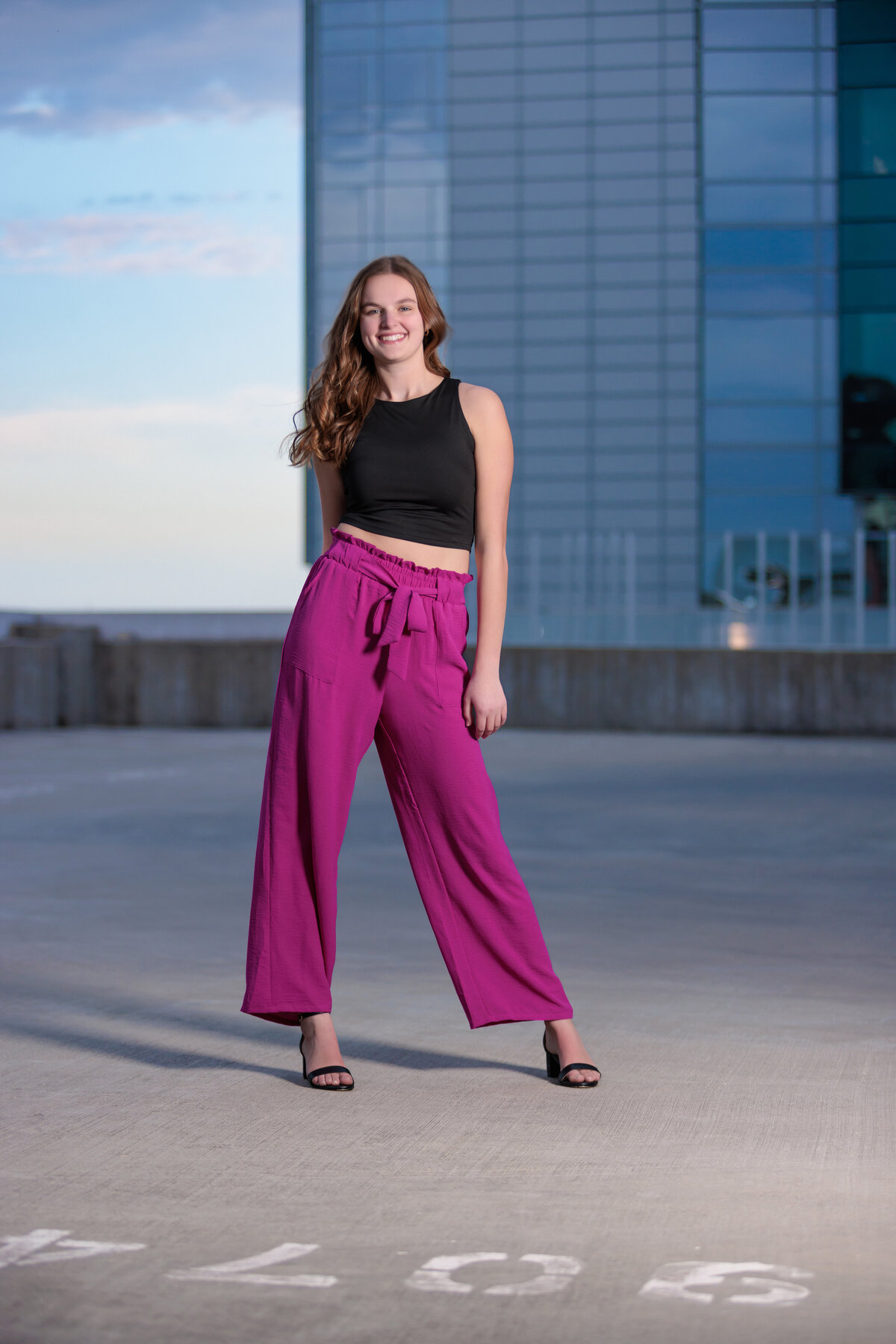 Rooftop Senior photos on a rooftop near Holly Springs NC