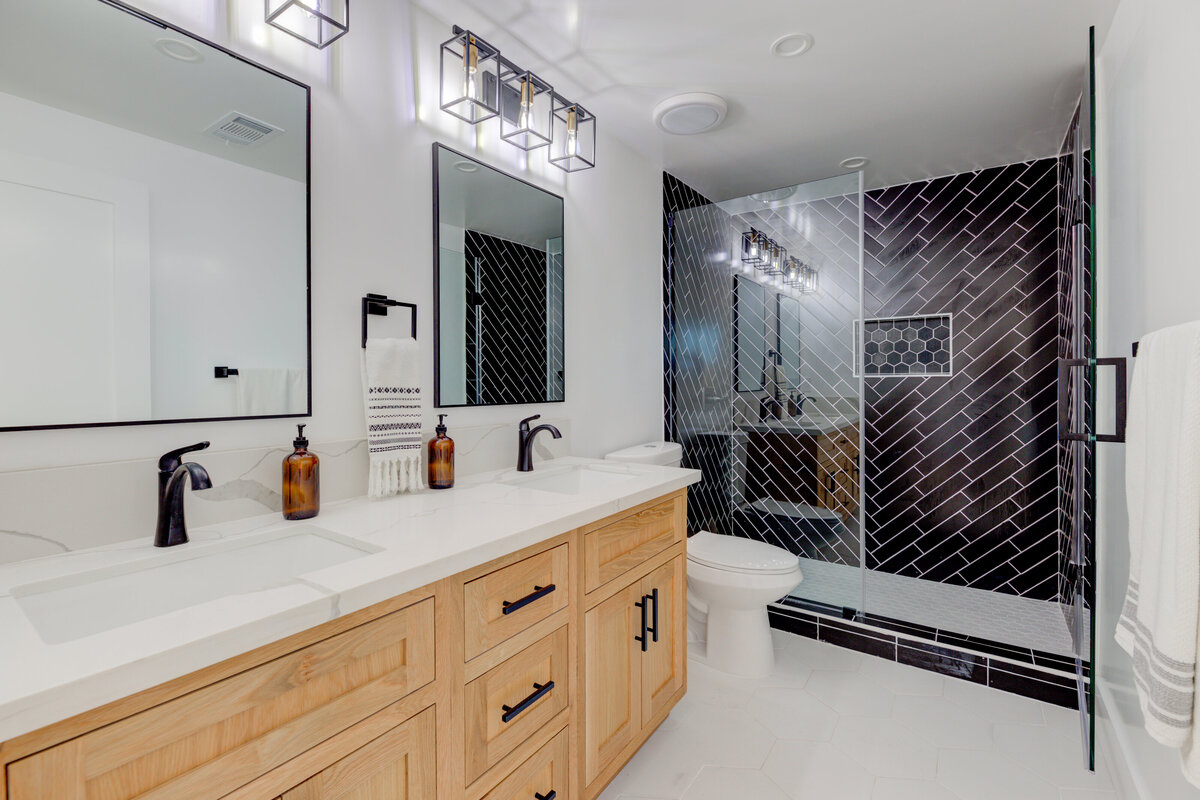 modern-black-shower-tile-double-vanity-bathroom-aw-development