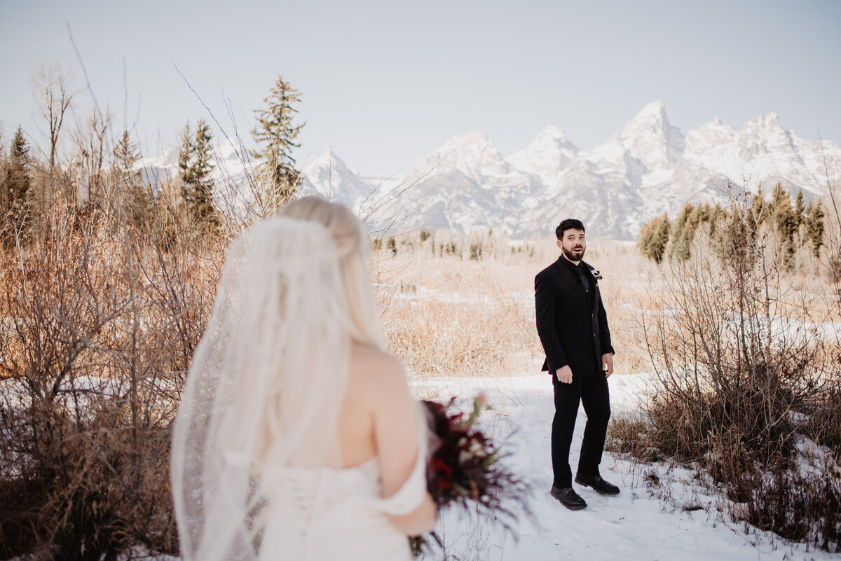 Jackson Hole Photographers capture groom turning to see bride during first look