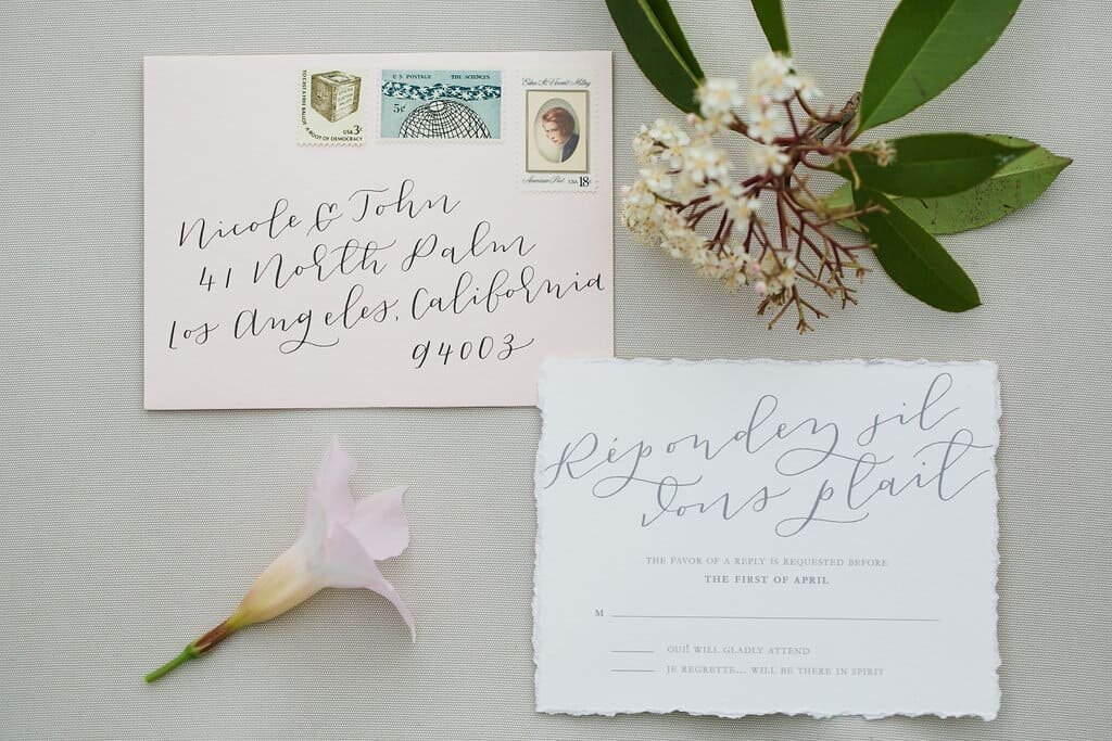 wedding-invitations-flat-lay-white-grey