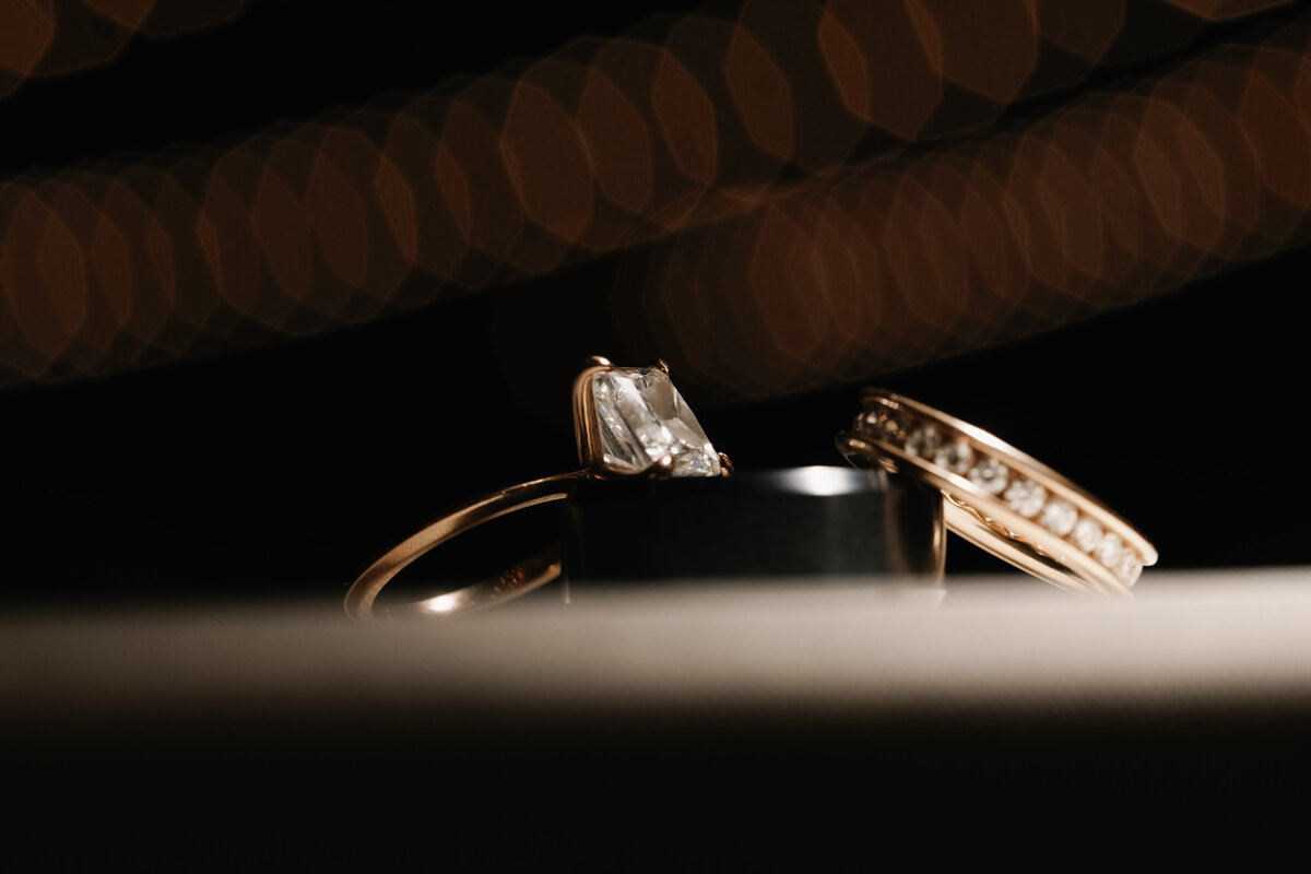 wedding rings resting on each other