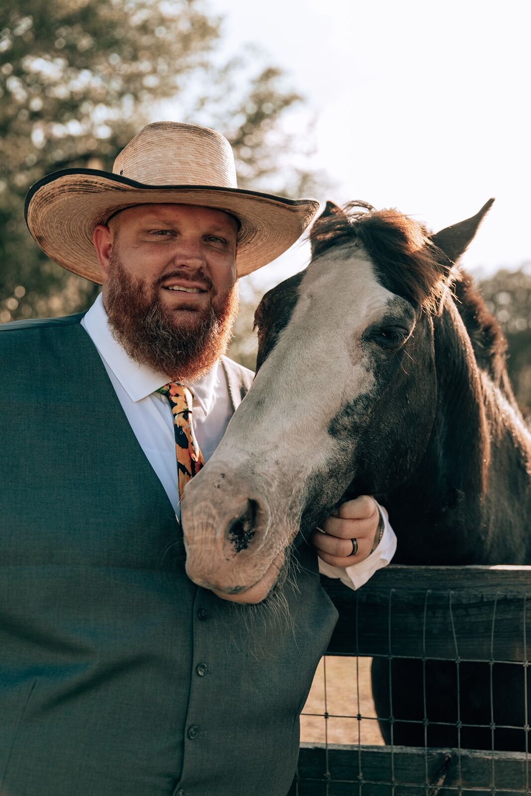 groom takes a photo with the resident horse at the farmhouse on 44