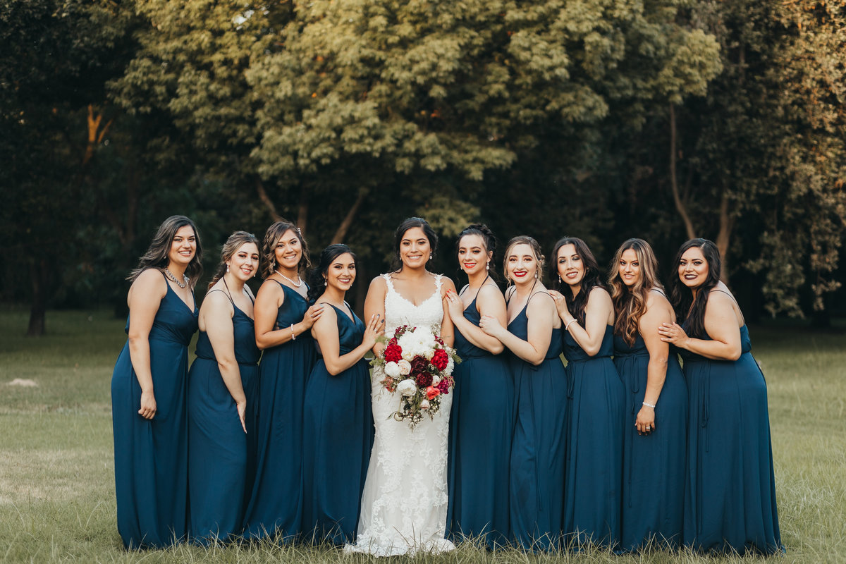 Look at this gorgeous bride. Wedding was located in Modesto california. The navy blue bridesmaid dresses went so well with the brides flowers.