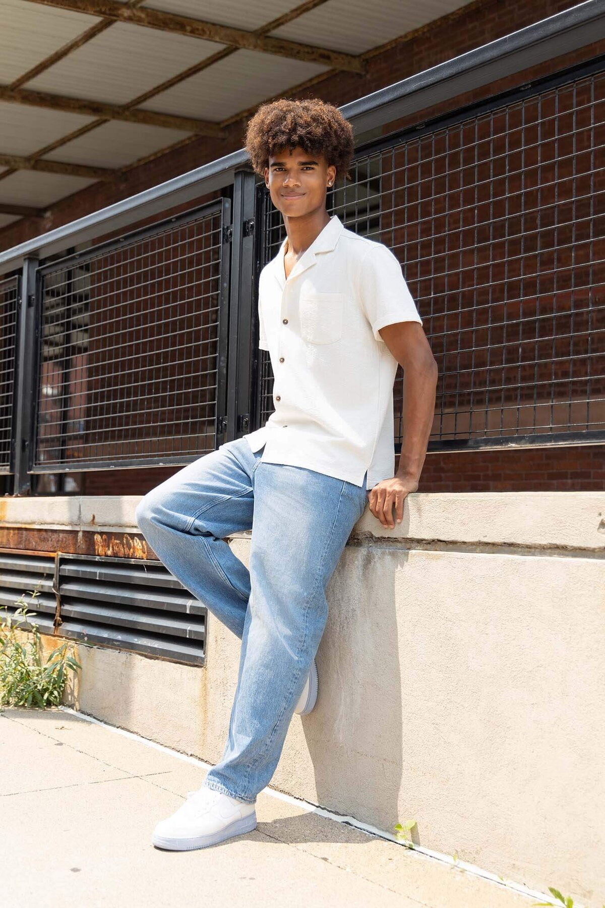 senior-guy-in-downtown-with-white-outfit