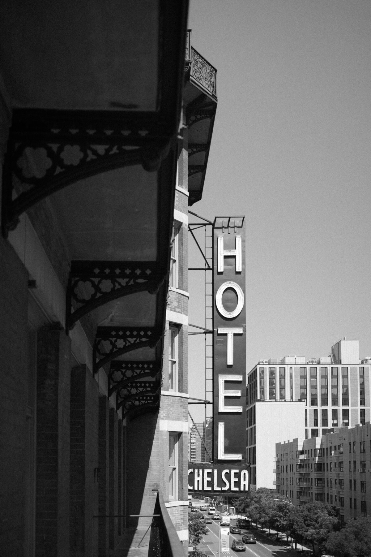 Bride and groom getting ready at the iconic Hotel Chelsea in New York City during their intimate elopement, captured by NYC wedding photographer Perry Hancock.