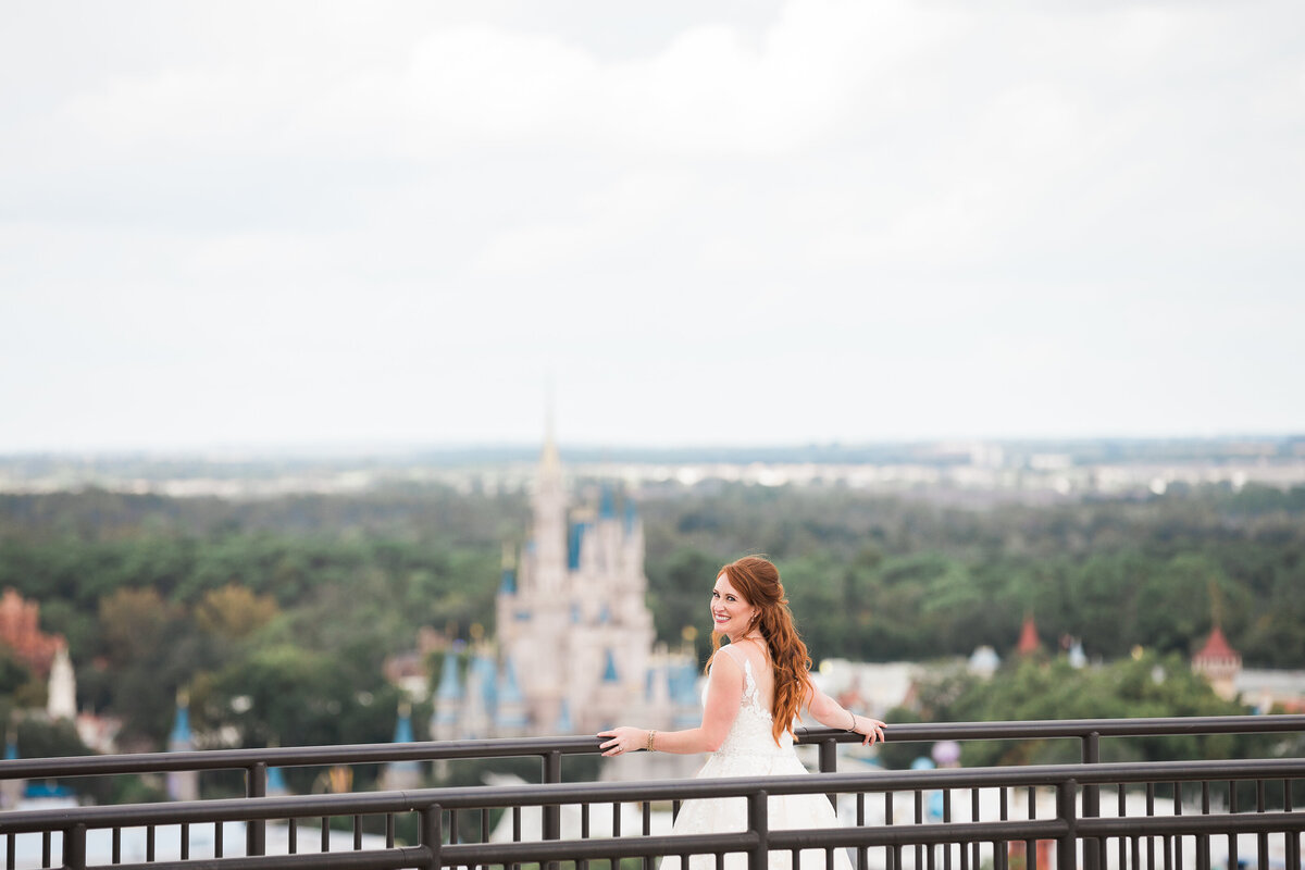 Bride posing while overlooking Disney