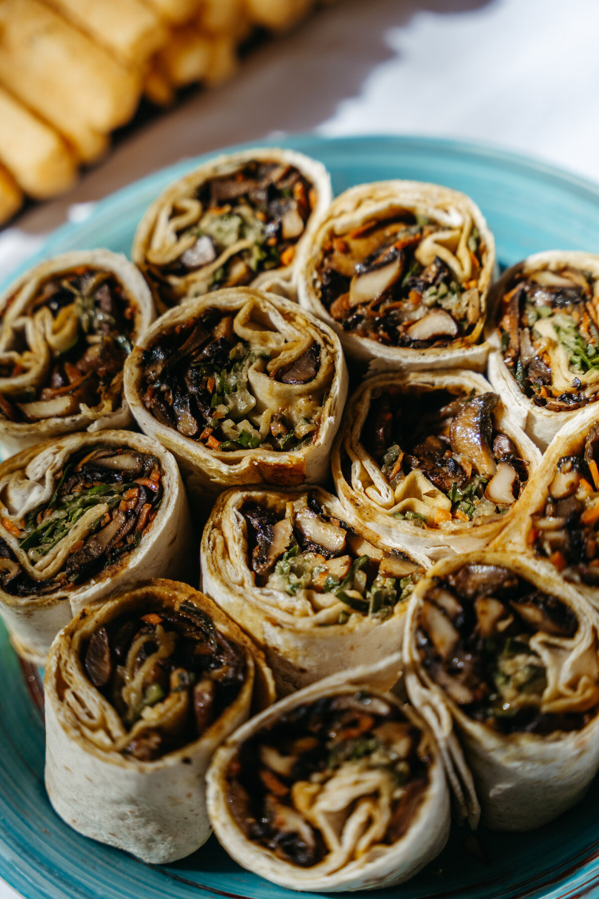 Vegan tortilla wraps filled with fresh vegetables