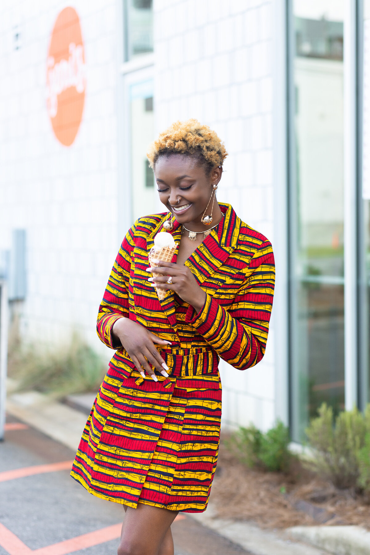 Young black woman with ice cream.