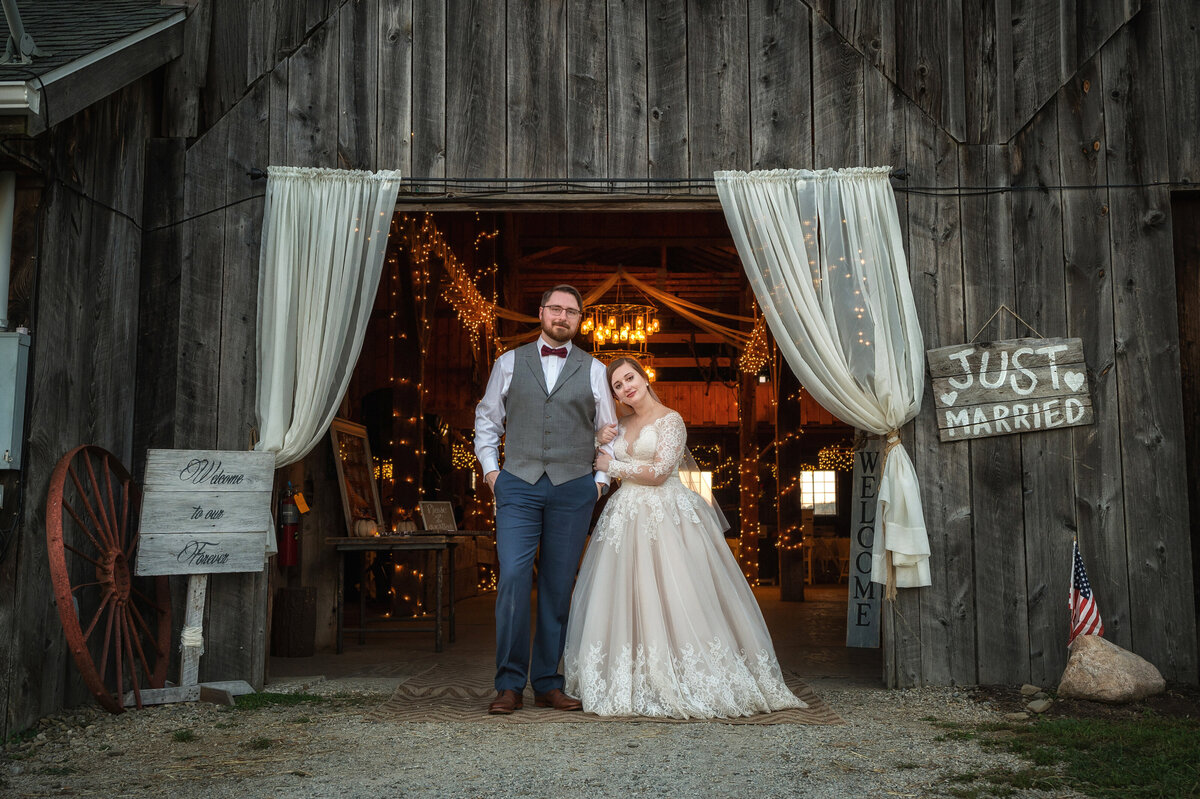 Wedding at a barn with sign saying Just Married.