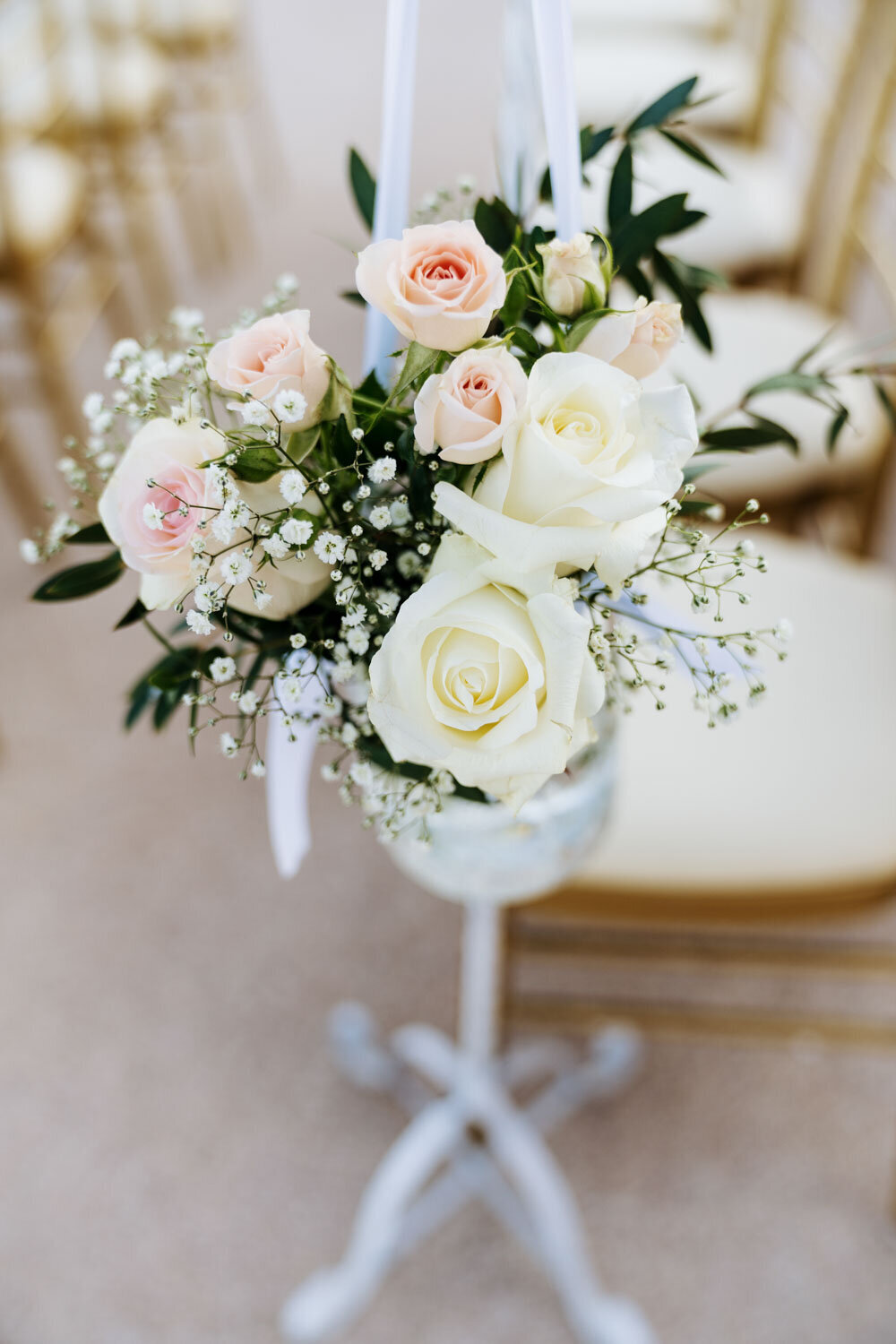 floral arrangement with white and pink roses
