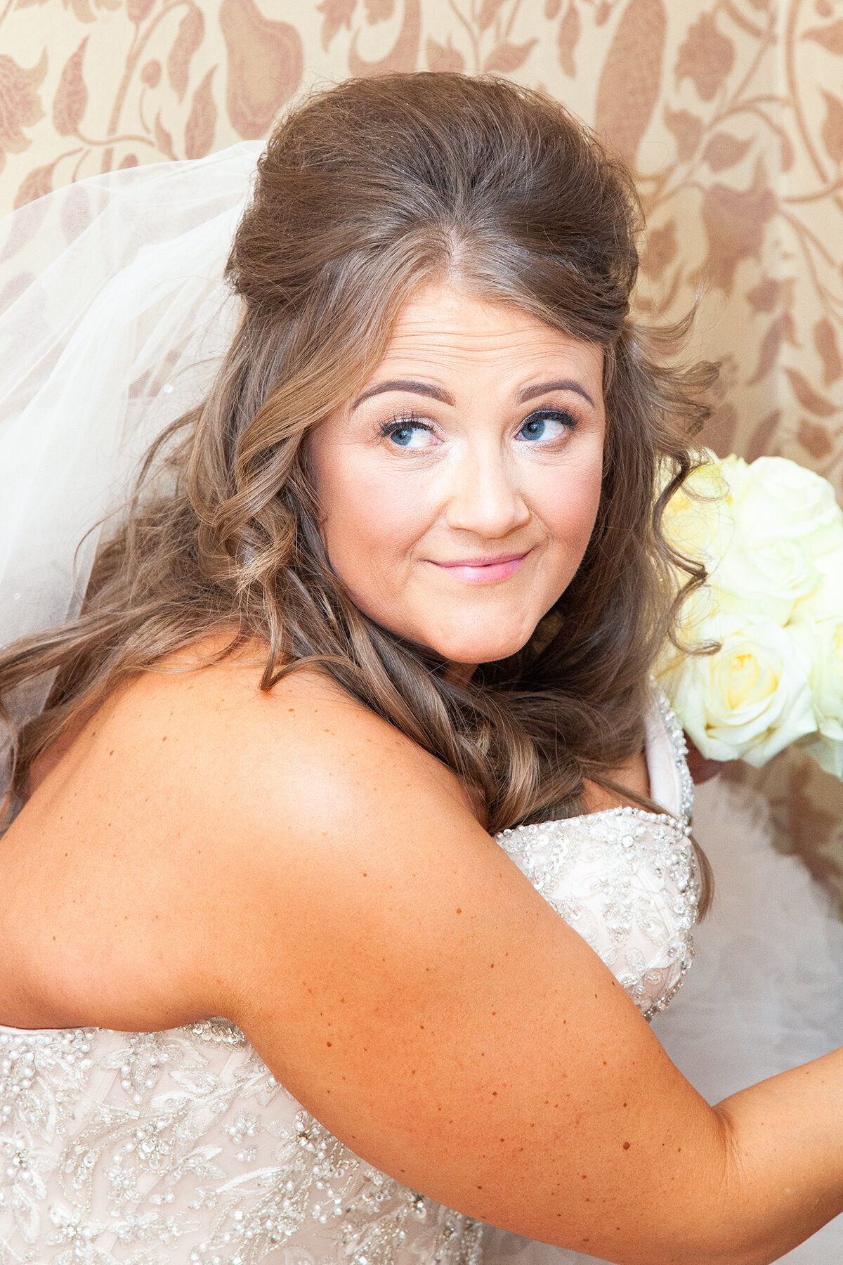 pro-story-photography_head-and-shoulder-portrait-of-smiling-bride_duke-of-cornwall-hotel_plymouth