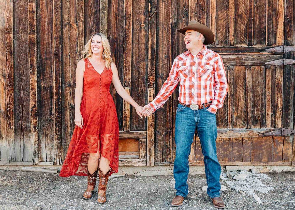 Engagement photo of Montana couple holding hands at Travelers' Rest State Park, Lolo, MT