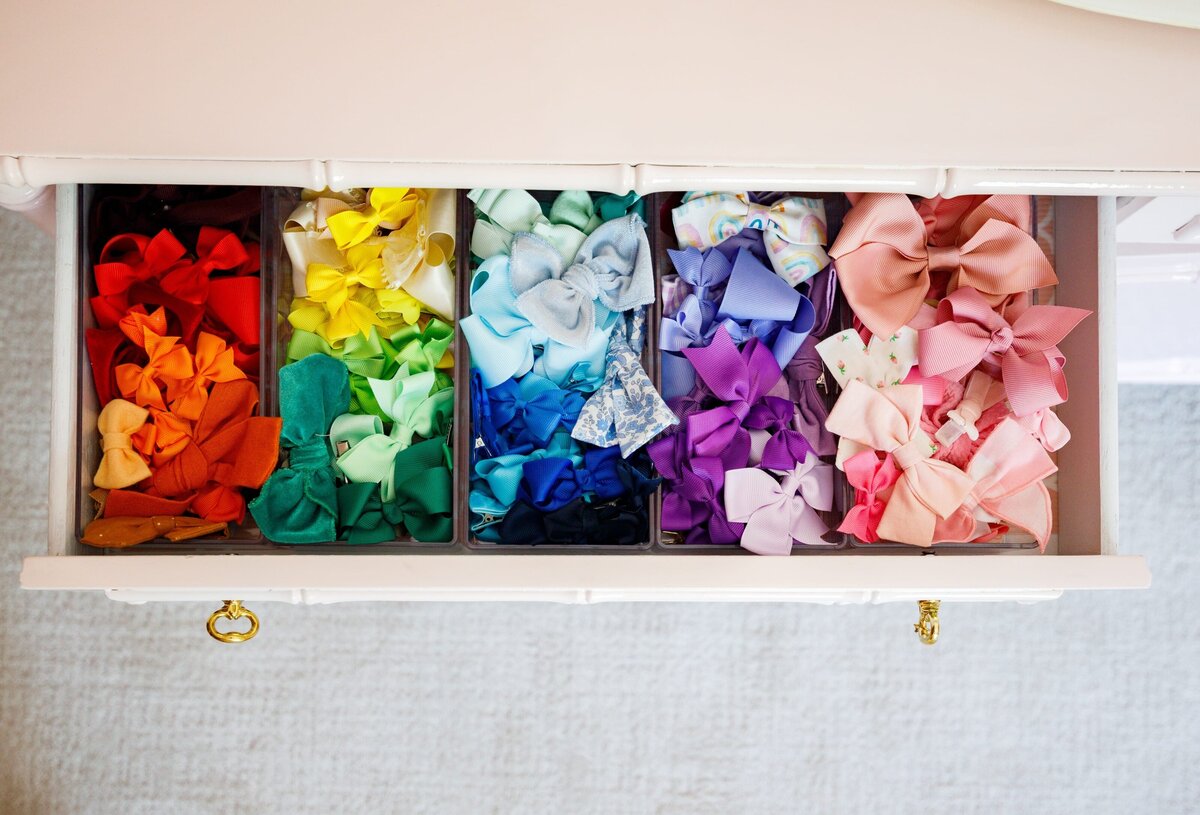 vision and hammer drawer with colorful bows in girls room