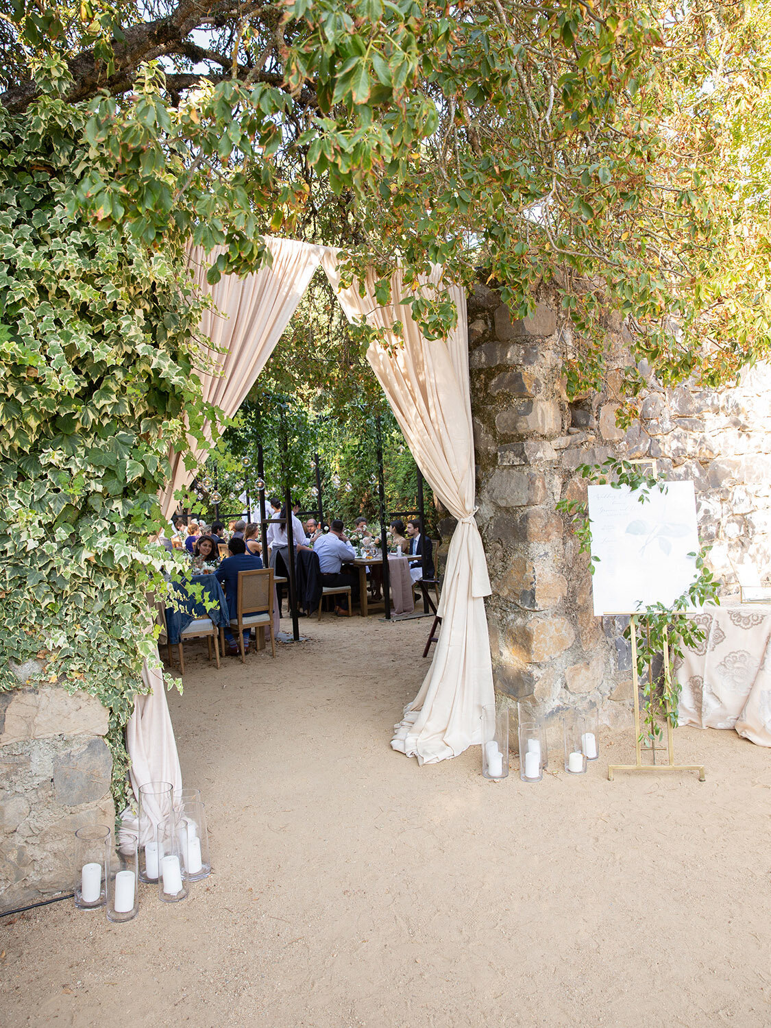 annadel-estate-elegant-sonoma-winery-wedding-reception-entrance-curtains-tie-back-candles