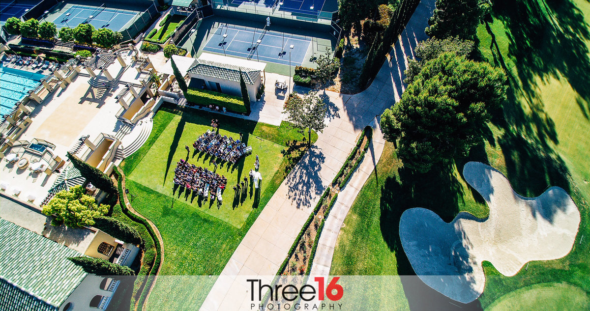 Aerial view of a wedding ceremony at the Marbella Country Club