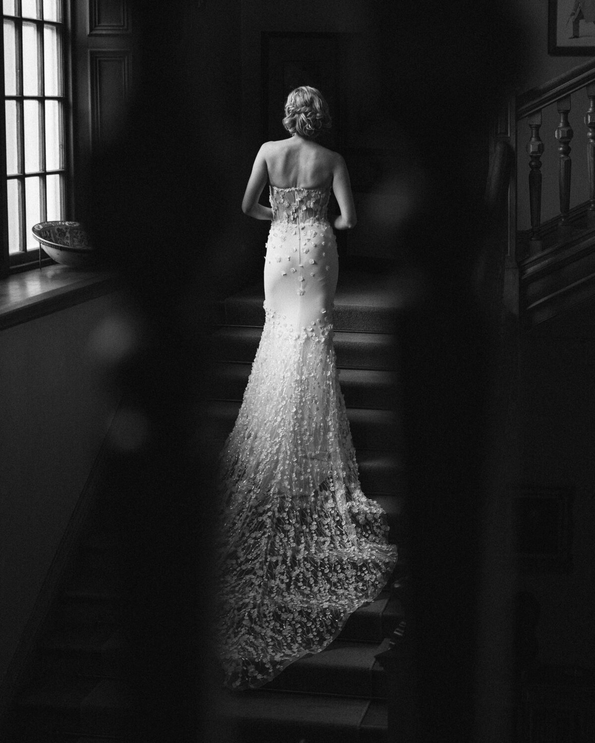 Back of a bride on staircase