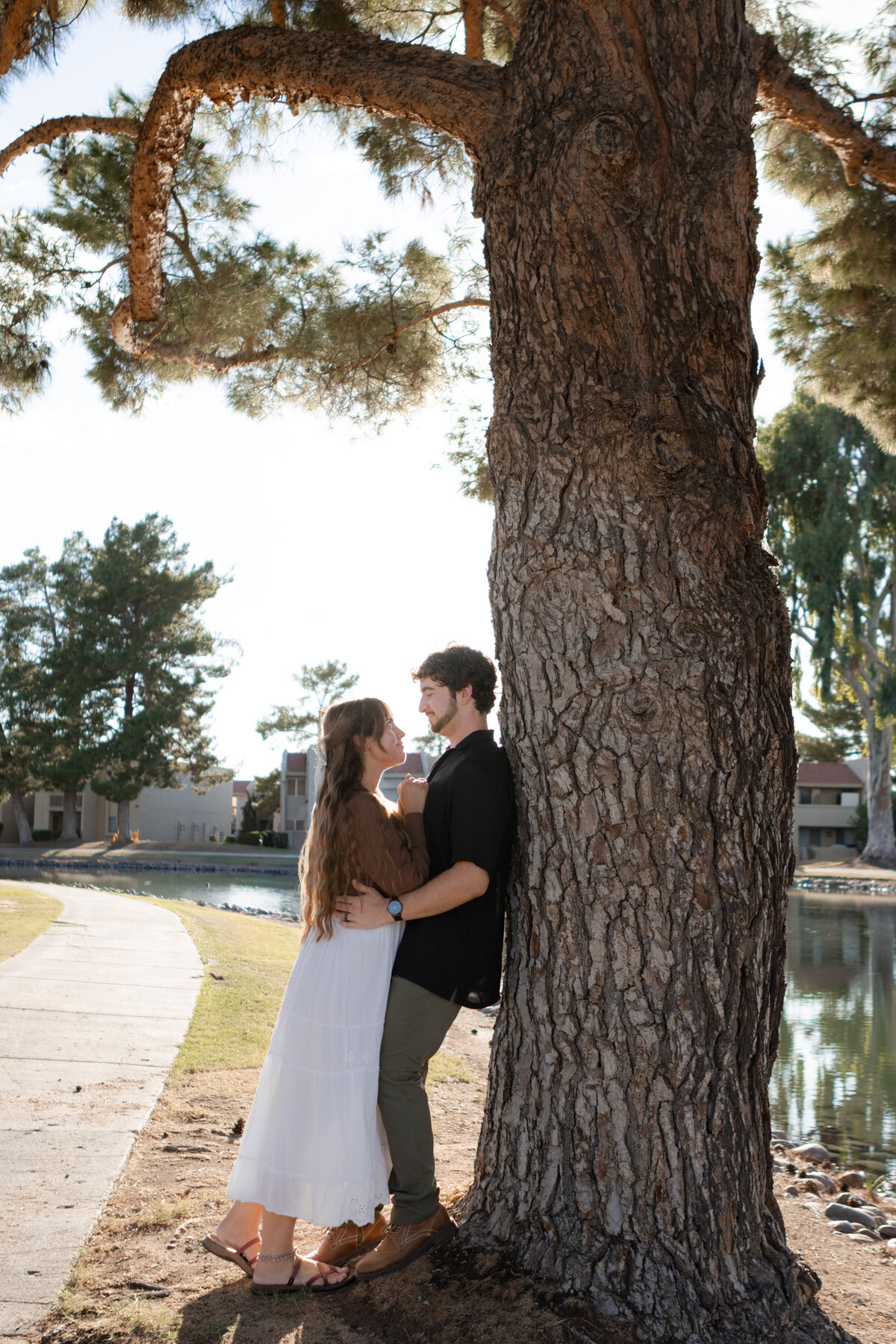 Jovanna G Photography. Classic, sophisticated Wedding Photos. Soft romantic engagement photos. Soft romantic WeddingPhotos. Sophisticated Wedding Photographer. Professional Wedding Photographer. Destination Wedding Photographer. Luxury Wedding photographer. Traveling Wedding Photographer. AZ Wedding Photographer. Gilbert AZ Wedding Photographer. Queen Creek Wedding Photographer. Phoenix Wedding Photographer. Scottsdale Wedding Photographer. Flagstaff Wedding Photographer. SoCal Wedding Photographer. California Wedding Photographer. Northern California Wedding Photographer. Southern California Wedding Photographer. San Francisco Wedding Photographer. Bay Area Wedding Photographer. San Jose Wedding Photographer. Golden Gate Bridge Wedding Photographer. Beach Lover Wedding Photographer. Palace of the Fine Arts Wedding Photographer. Ocean Lover. I love California. Orange County Wedding Photographer. Newport Beach Couples Photographer. Newport Beach Wedding Photographer. Laguna Beach Couples Beach Engagement Photographer. Laguna Beach wedding beach photographer. Los Angeles Wedding Photographer. Young and in love engaged couples who live in southern California. Christian Young Couple. Young Engaged Couple. Engaged High School Christian Couple. Christian Values. Young conservative Christian women. Young Conservative Christian men. Young Conservative Christian Couple. Young Christian Couple Engaged in High School. Young Christian College Couple. Lakeside Lovers in the Autumn Sun. David & Grace - engagement photos. Jovanna G Photographer Engagement Photos. Arizona sun shining through autumn trees- engagement. Chandler, AZ Engagement Photos. Chandler, AZ 2026 bride. Chandler, AZ Wedding Photographer. Chandler, AZ Young Engaged Couple. Girl in her 20s. Engaged Arizona Girl in her 20s. Lakeside Engagement photos. AZ Lakeside Engagement Photos. AZ Weeping Willow Lakeside Proposal. Arizona Lakeside Proposal with weeping willow tree. Detail shot of engagement ring on Arizona Lakeside estate. Chandler, AZ Lakeside Estate Proposal Outfit Inspiration.