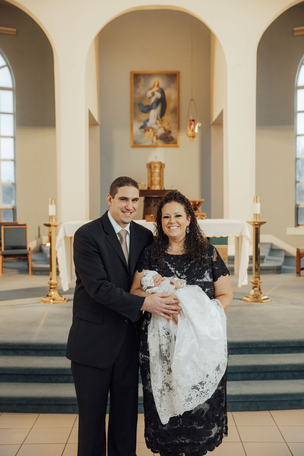Baptism Photographer | Baby’s baptism taking place at the church altar | Hunterdon County, New Jersey