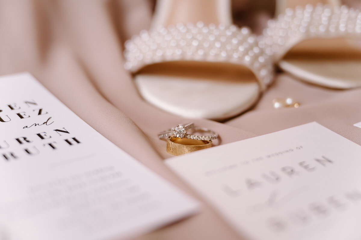 wedding invitation and bridal shoes