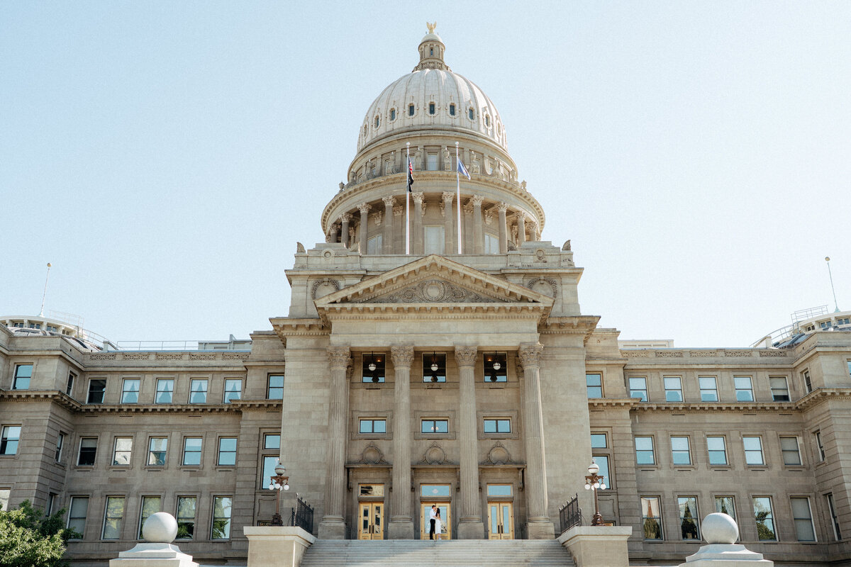 Couple during golden hour engagement shoot in Boise, Idaho wedding/elopement - photographed by The Storytellers