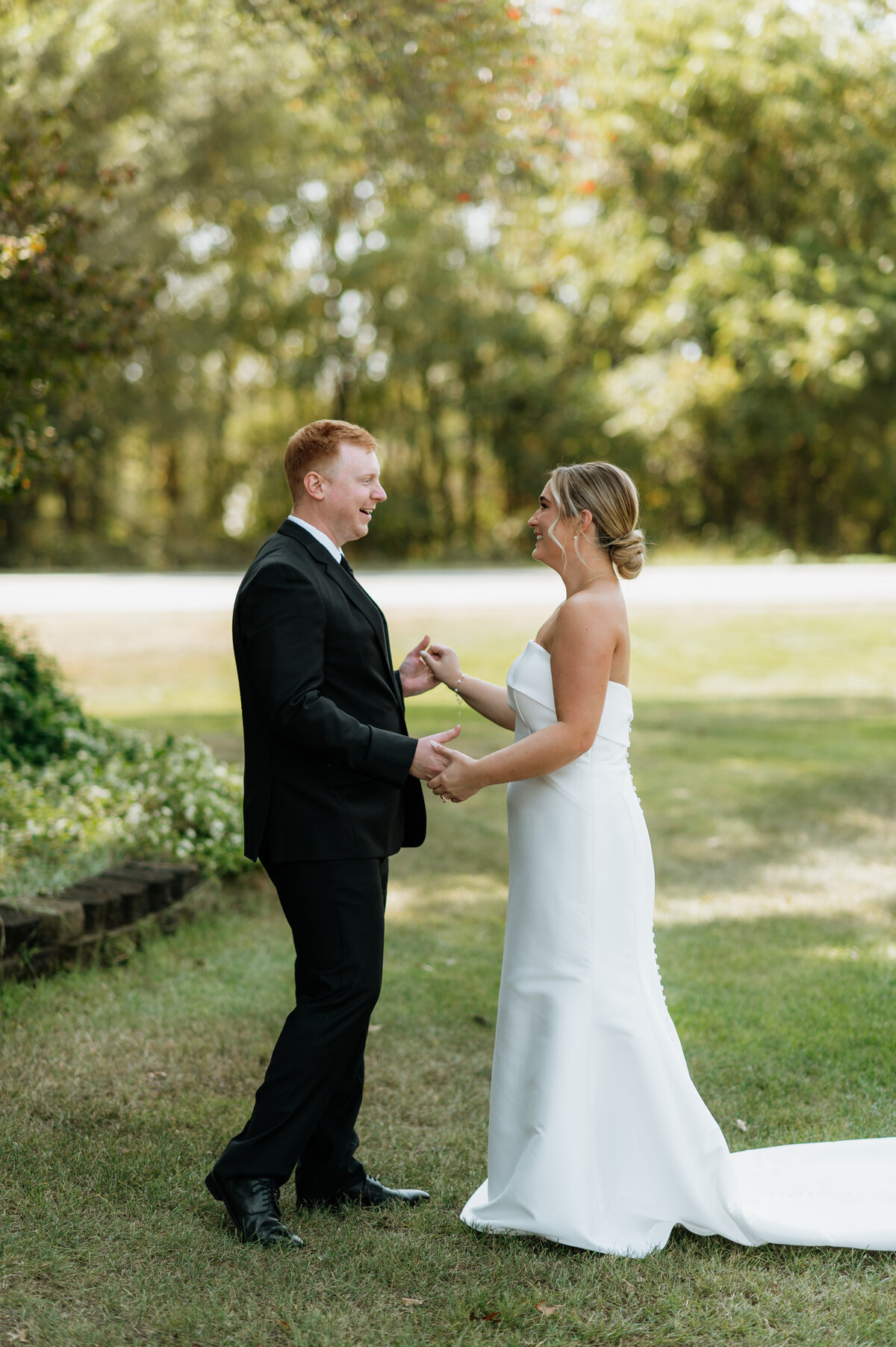 Bride and groom first look outside
