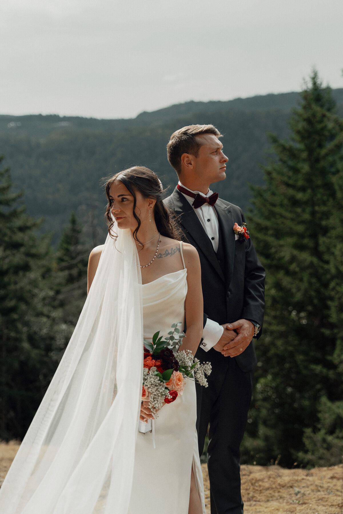 Bride and groom at a lookout during their wedding portraits at Caleb Pike Heritage Park in Victoria by Latitude 49 Photography
