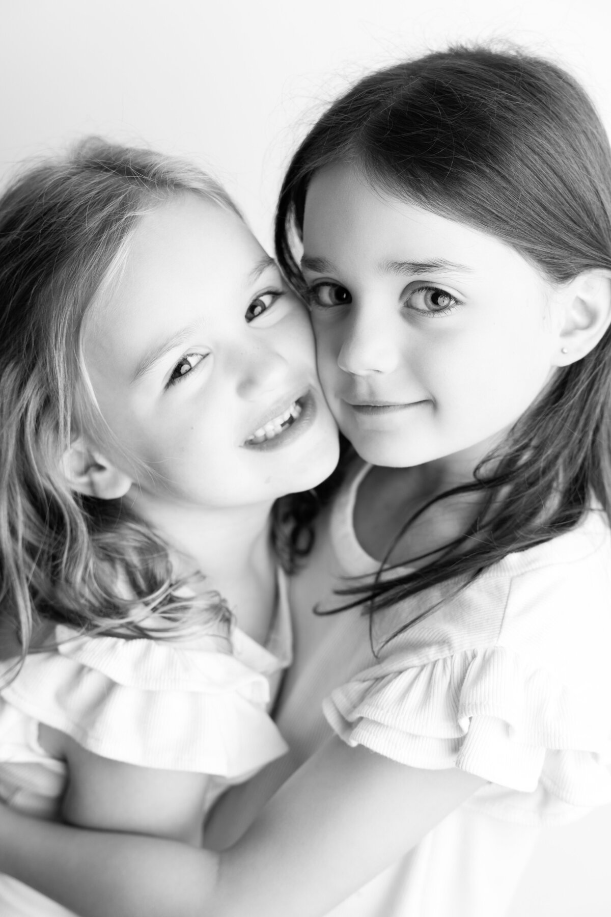 sisters black & white studio portrait 