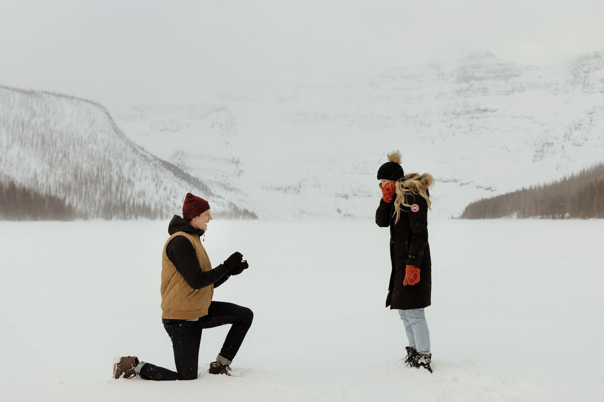 Surprise winter proposal in the mountains, by Malorie Reiter Photography, adventurous and authentic wedding photographer in Lethbridge, Alberta. Featured on the Bronte Bride Vendor Guide.