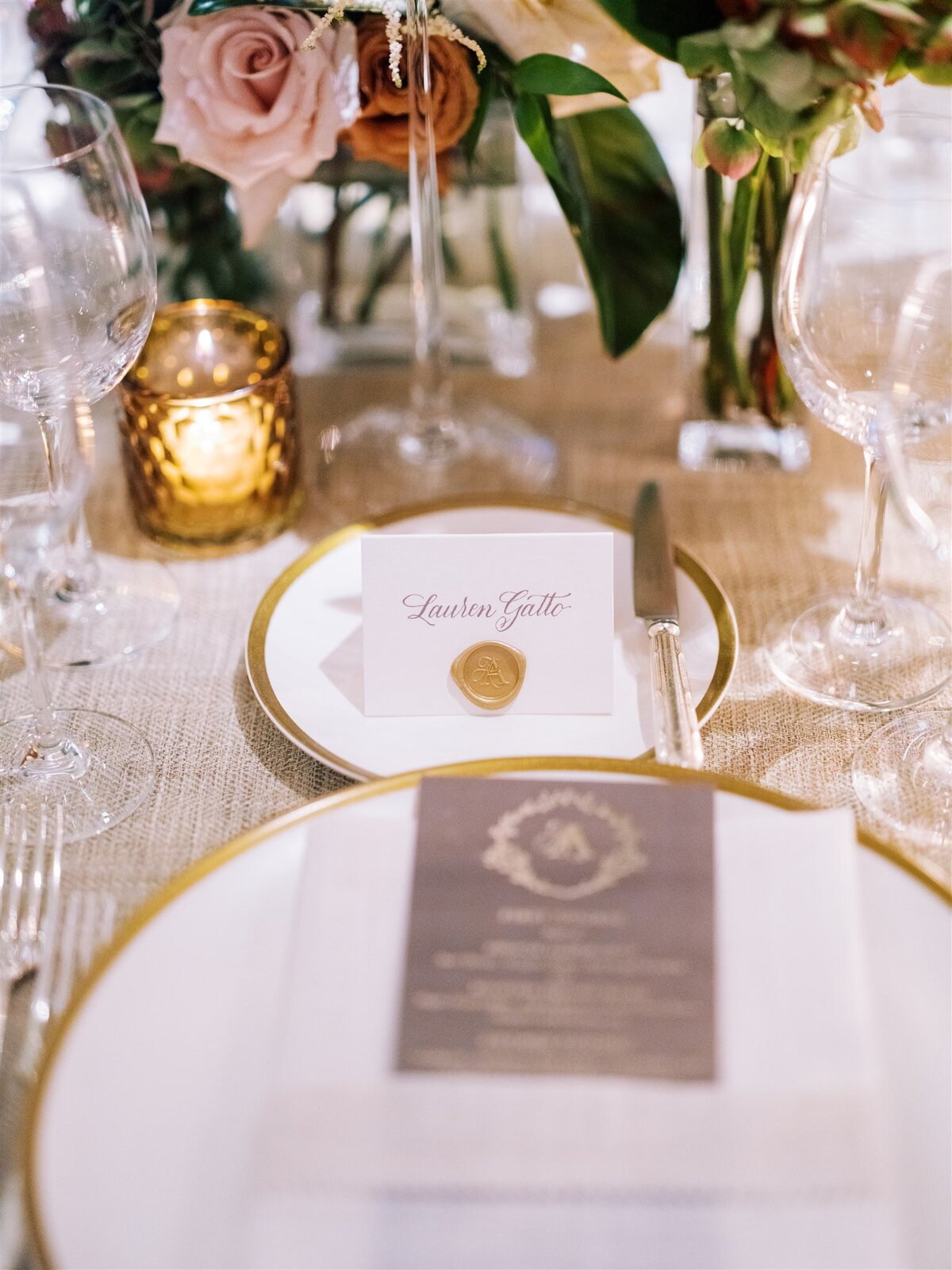 A table place setting at the reception table for the wedding at the Peninsula Chicago.