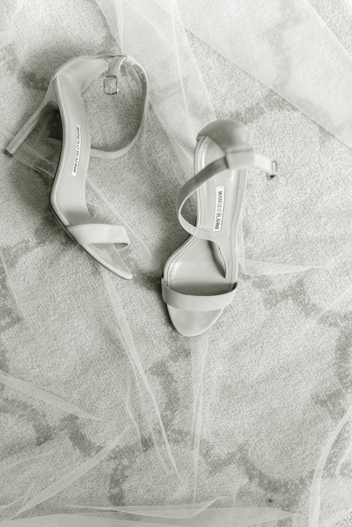 Manolo Blahnik bridal shoes on a Gleneagles wedding day.  Image by luxury fine art wedding photographer, Jill Cherry Porter.