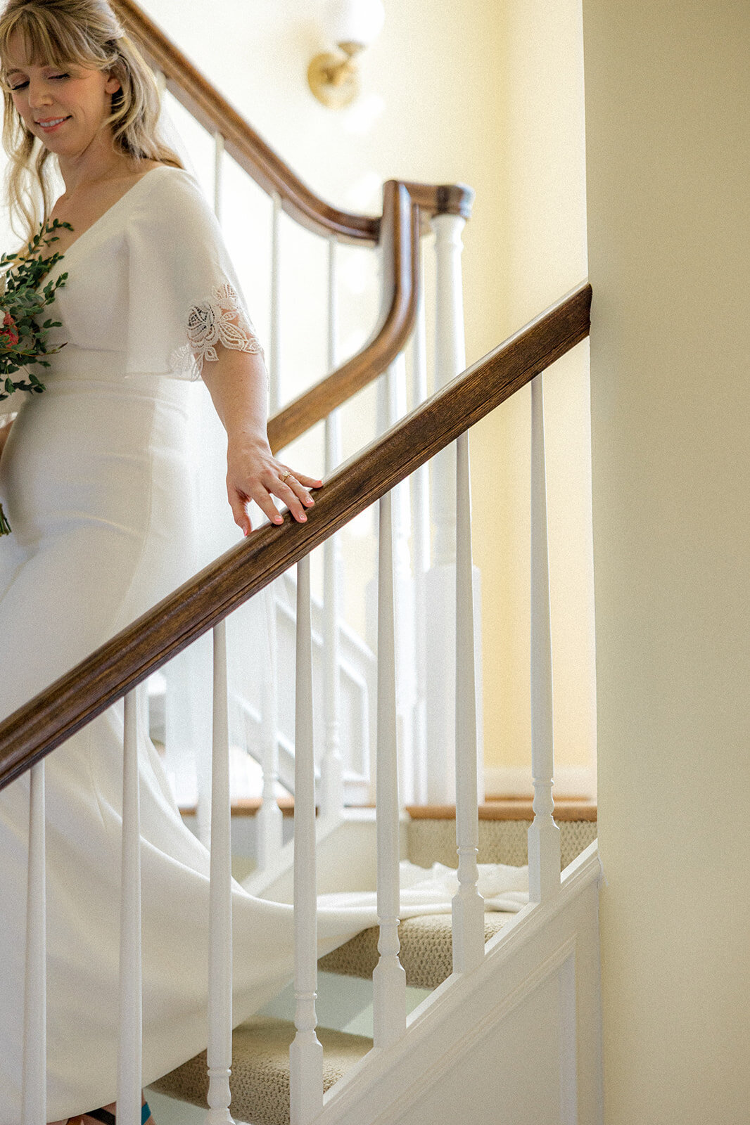 Bride walking down stairs in Asheville, North Carolina