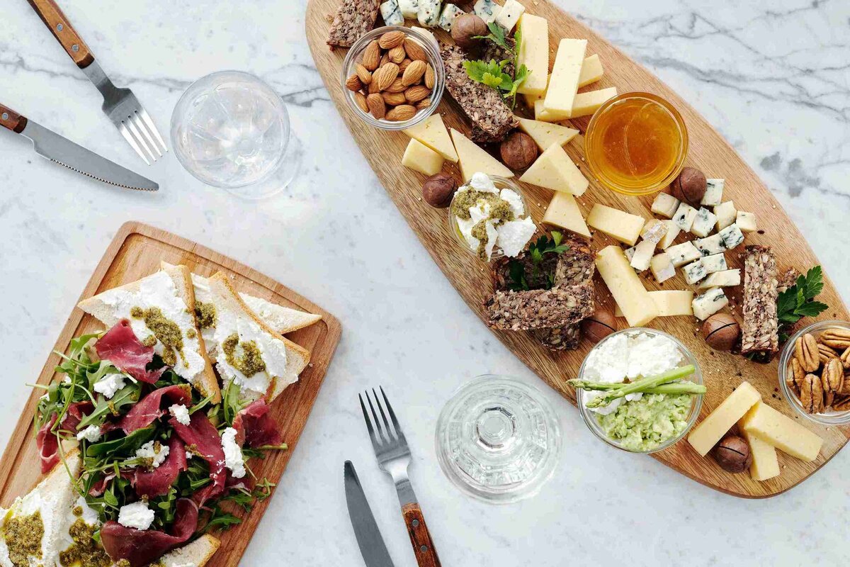 . A table filled with a colorful assortment of delicious foods, showcasing a non-diet nutritionist's approach to healthy eating.