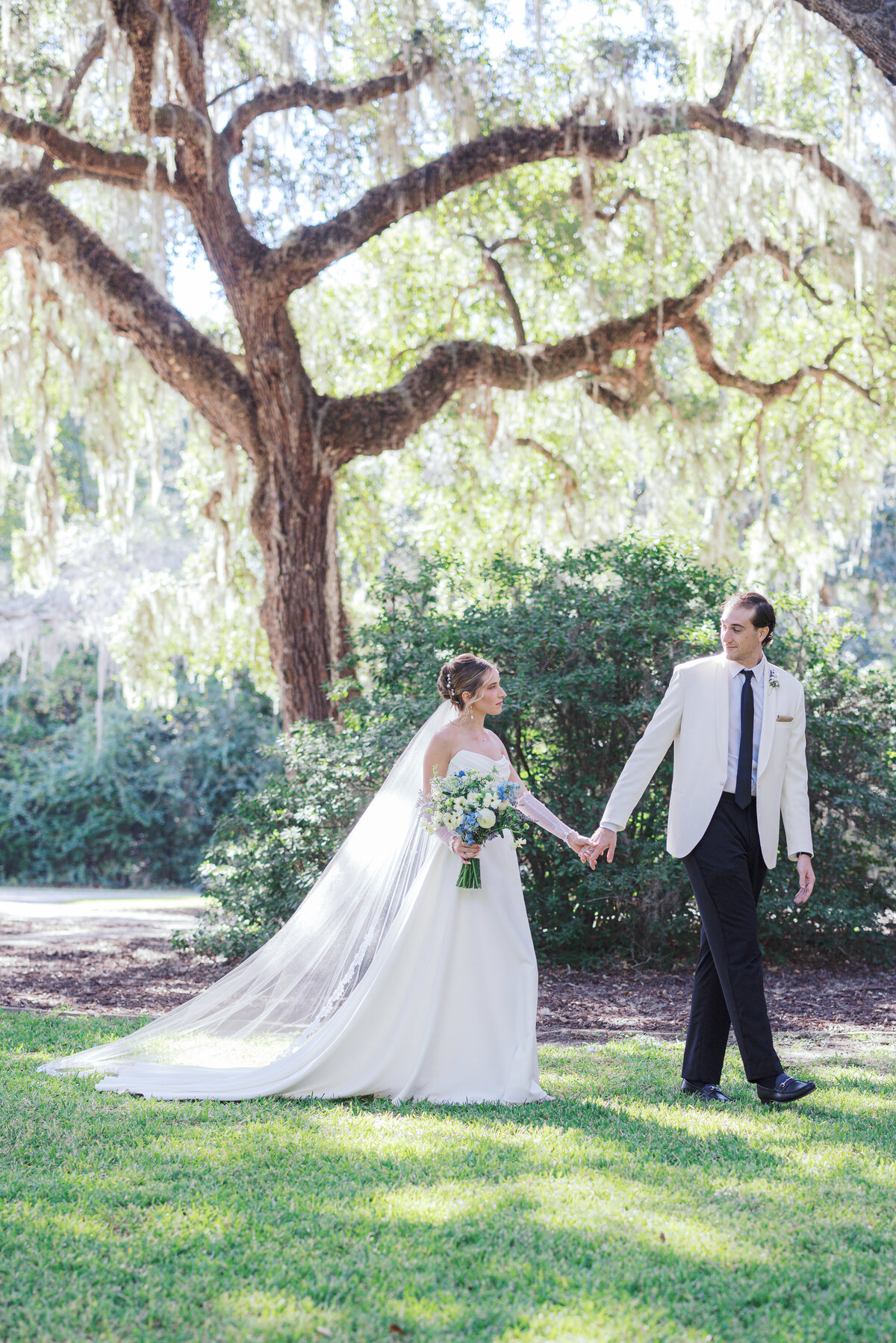 Bride and groom walk at Wingate Place