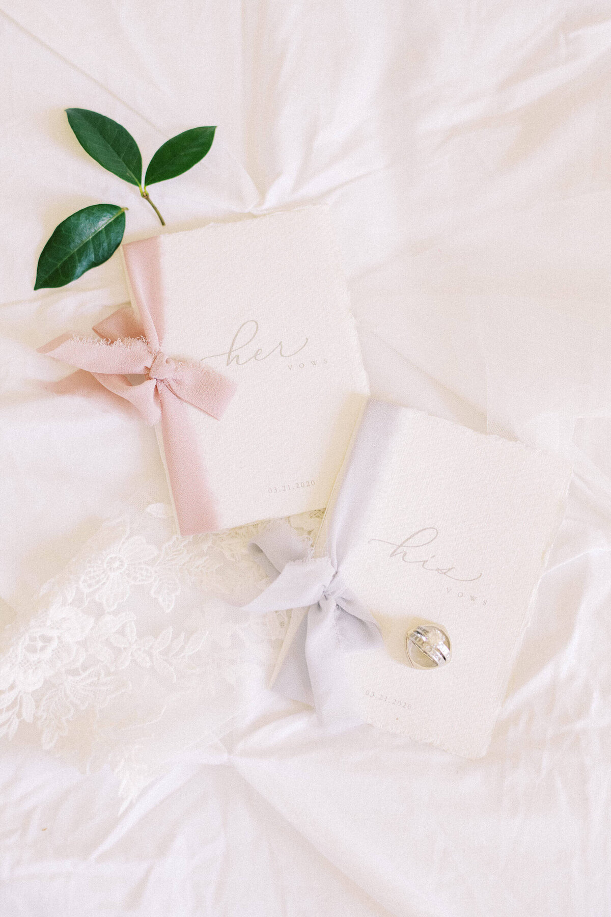 His and Her vow books with soft lighting at Texas wedding
