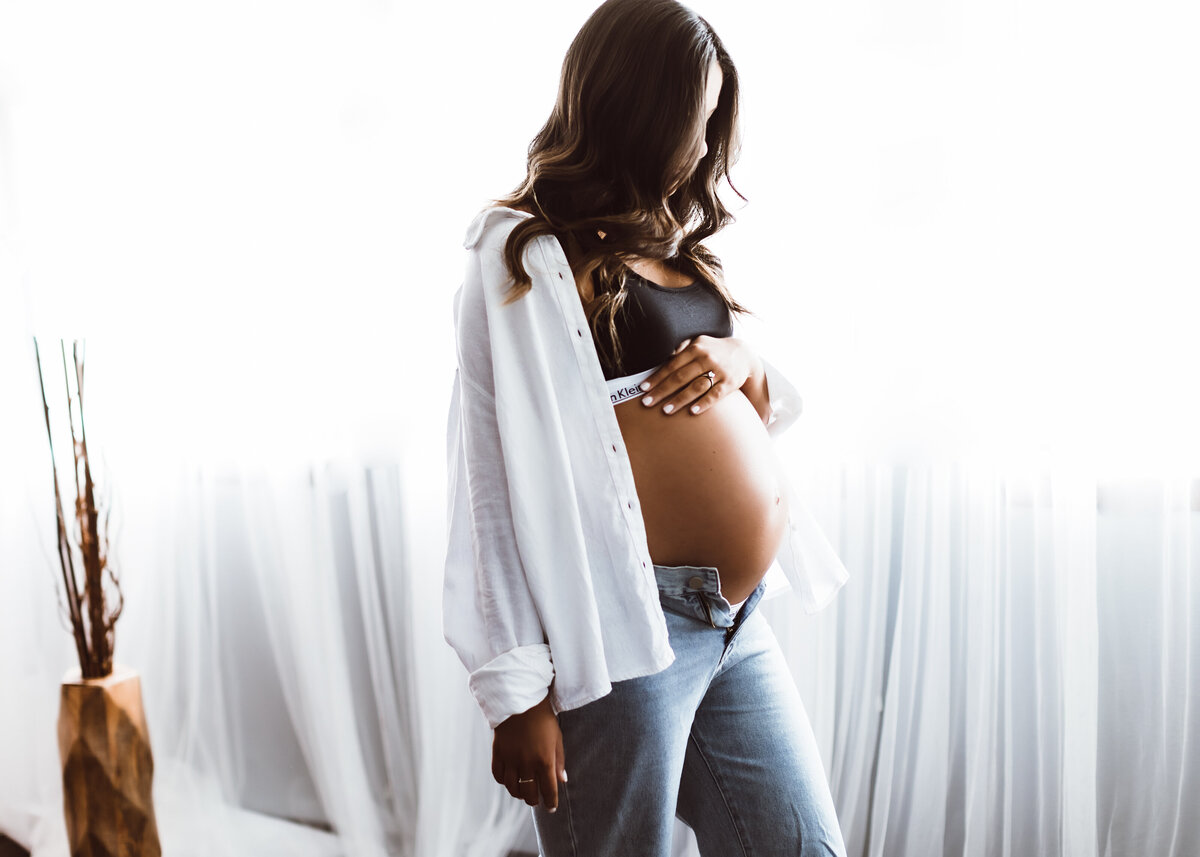 Simple beautiful backlit maternity portraits in Colorado photography studio