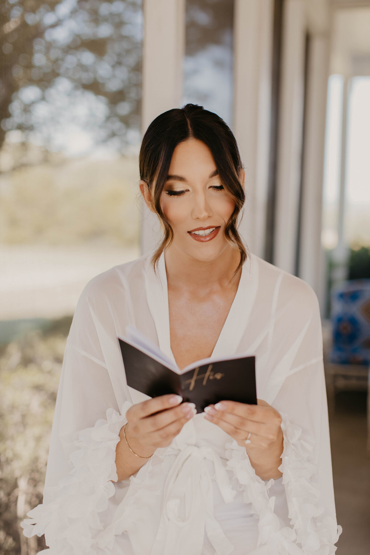 Bride reading letter from groom. 