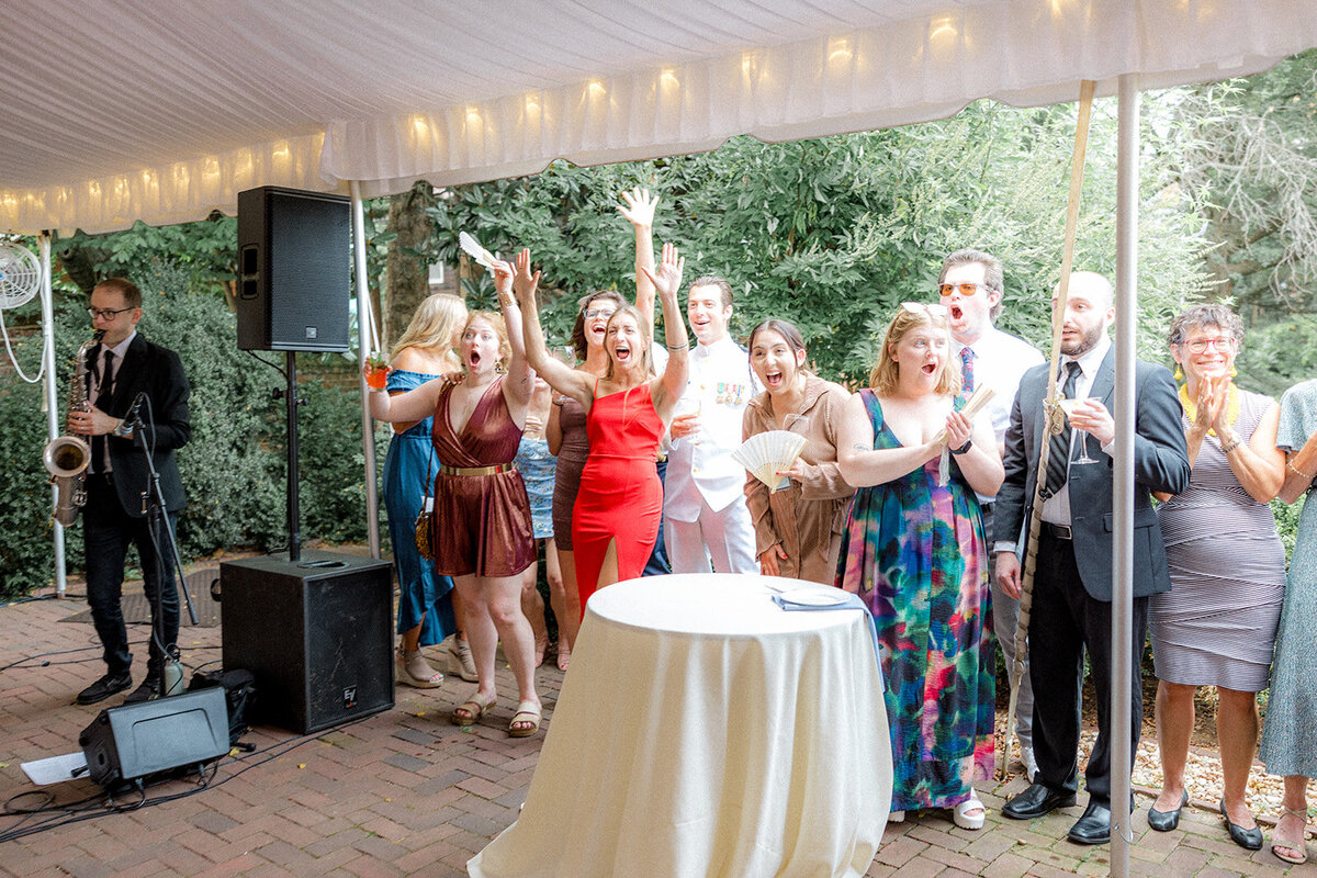 Wedding guests smiling and clapping