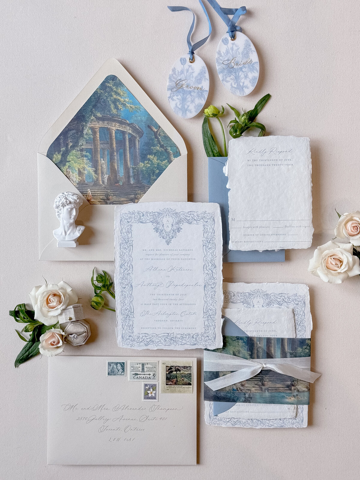 Blue and white Grecian inspired invitation suite with vintage stamps