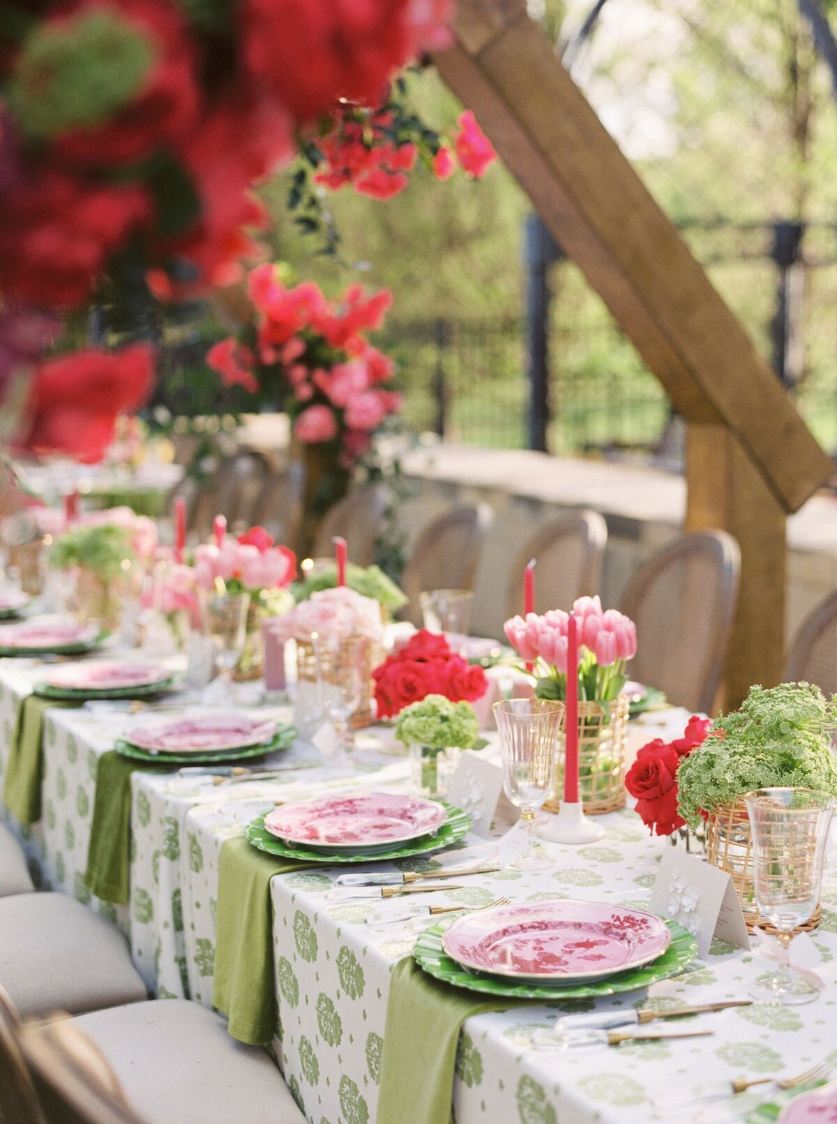 Pink red and green wedding tablescape
