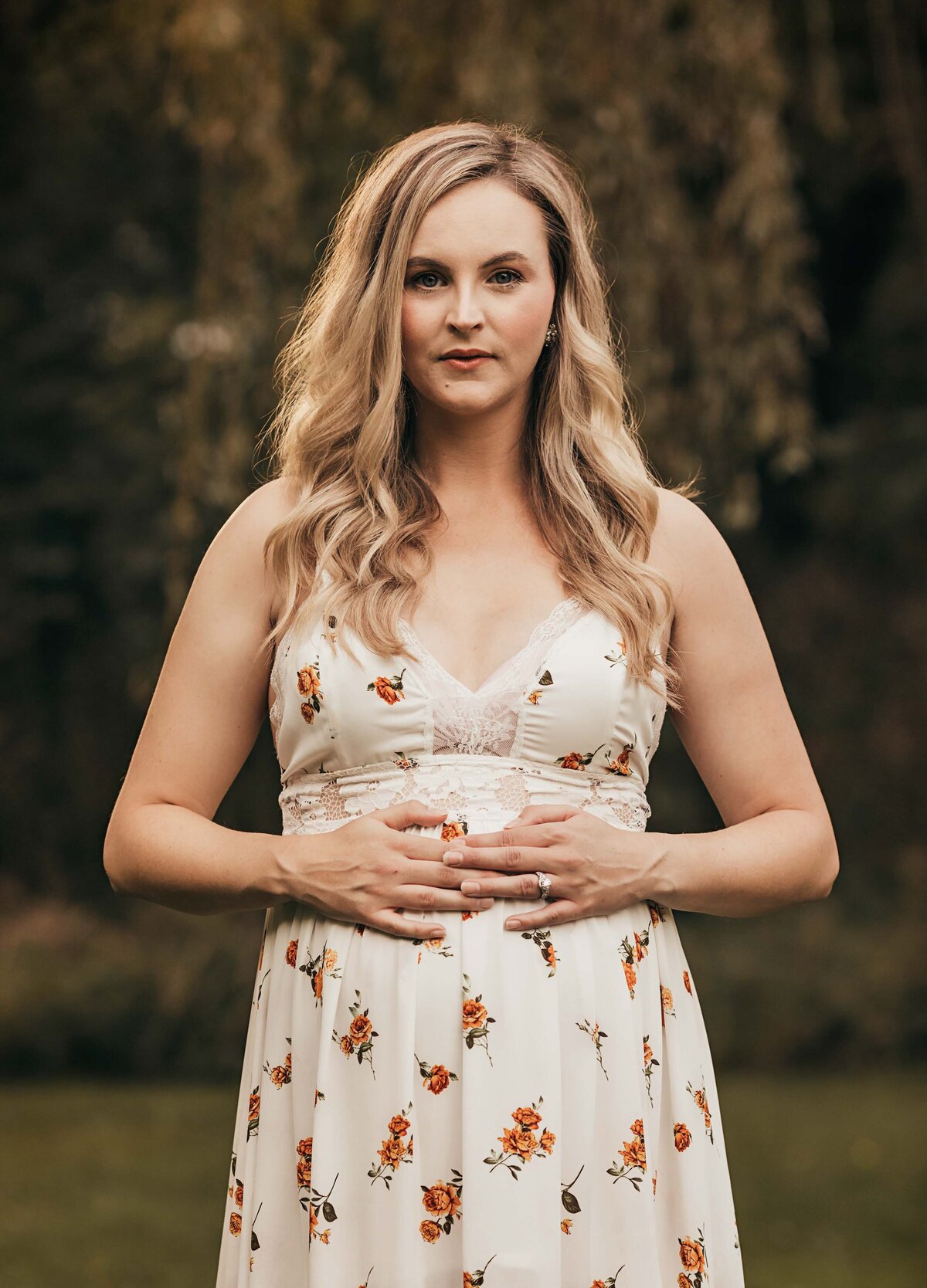 london ontario maternity photo mom touching belly