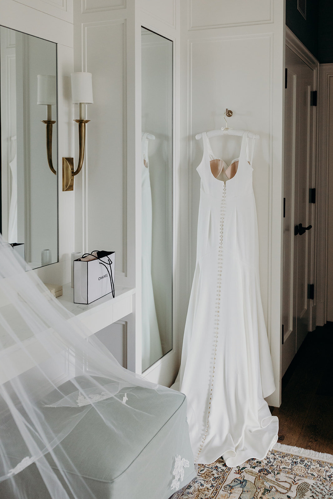 Hanging Wedding Dress with Chanel Bag