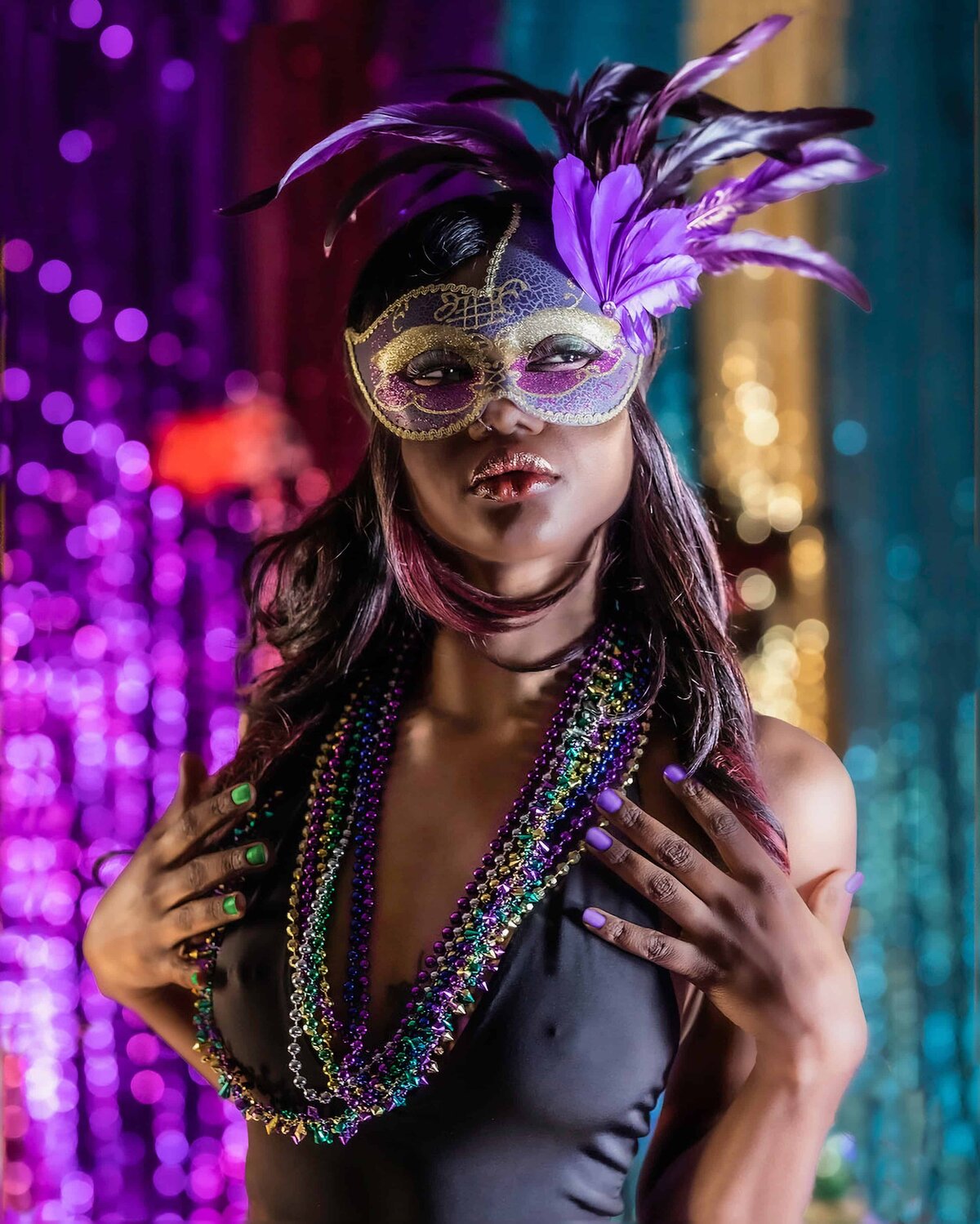 Mardi Gras woman with mask and colorful background 
